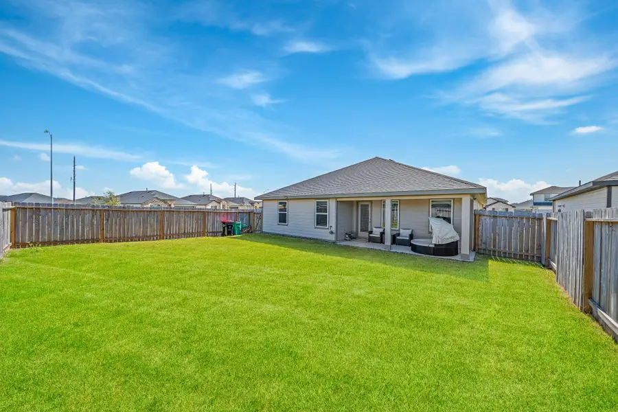 Exterior details and patio area of a home in , Fulshear (Image 3).