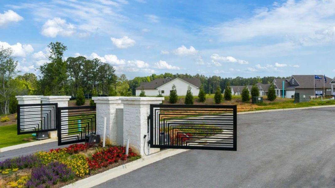 Front exterior of a new home in Hamptons at Riverwood North, Dallas, GA, highlighting curb appeal (Image 49).