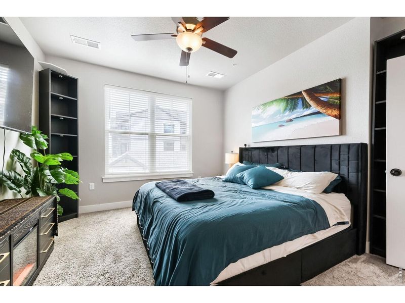 Furnished interior view inside a new home in Highlands at Fox Hill - The Flats, Longmont (Image 17).
