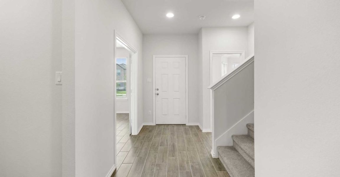 Representative exterior photo of a completed home built from the Dozier by Impression Homes in Redden Farms, Midlothian, TX (Image 6). Representative exterior photo of a completed home built from the Dozier by Impression Homes in Redden Farms, Midlothian, TX (Image 6).