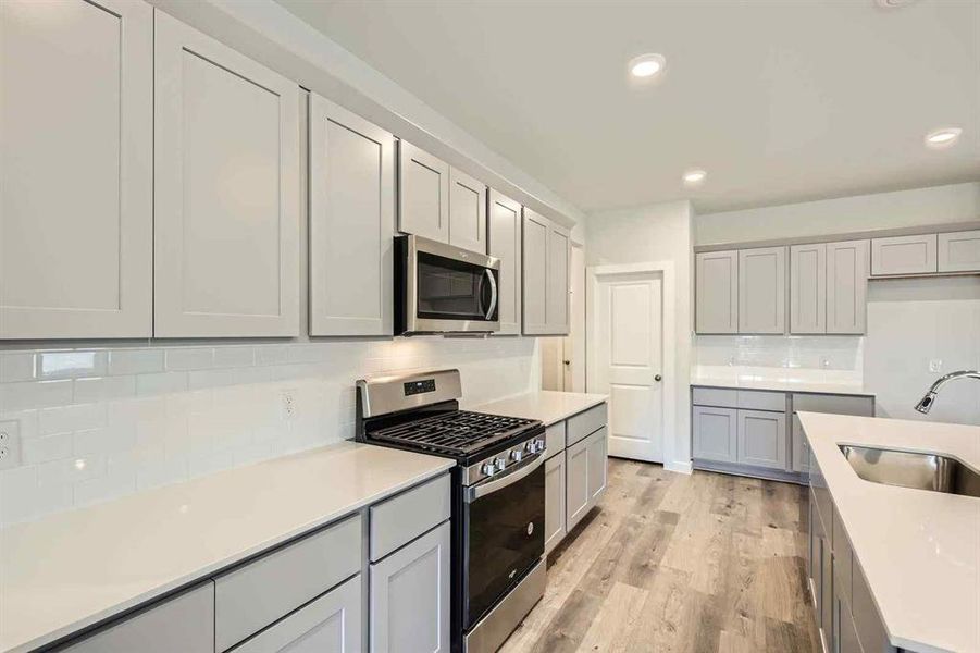 Furnished interior view inside a new home in Prestige Collection at Overland Grove, Forney (Image 6). Furnished interior view inside a new home in Prestige Collection at Overland Grove, Forney (Image 6).