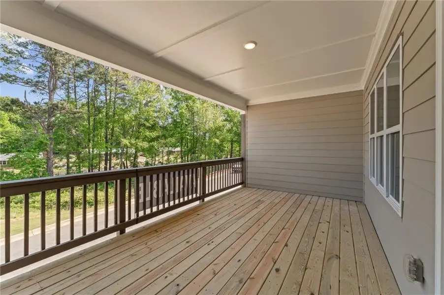 Exterior details and patio area of a home in Townes at South Main, Kennesaw (Image 3).