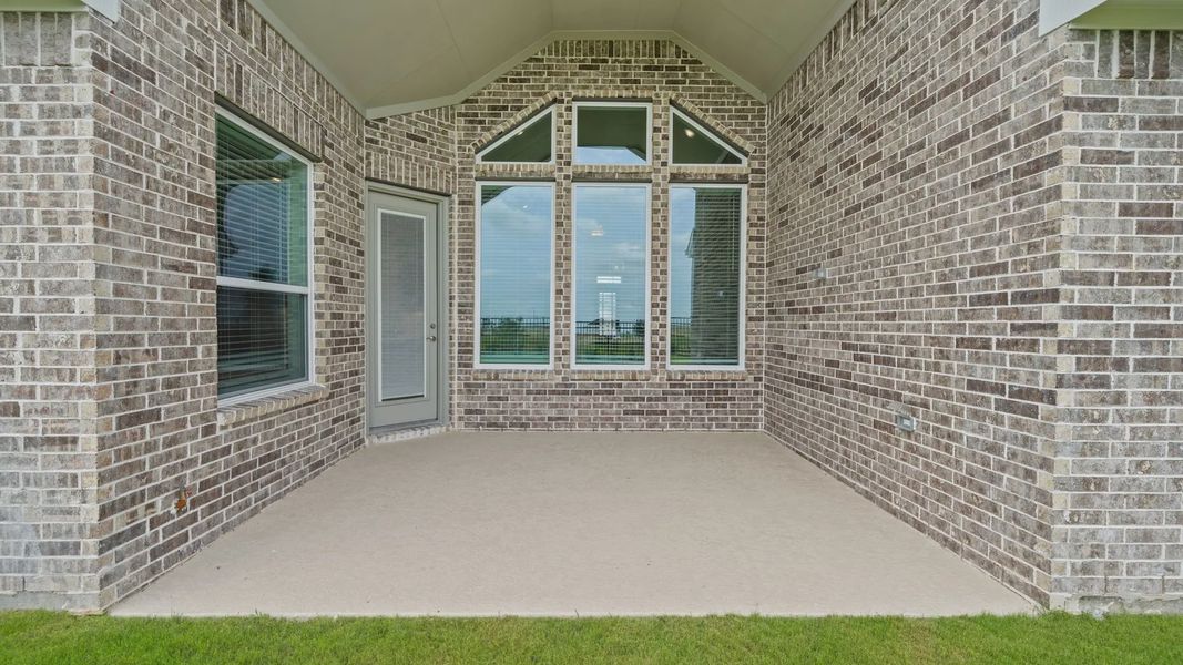 Exterior details and patio area of a home in Newhaven, Manor (Image 3).