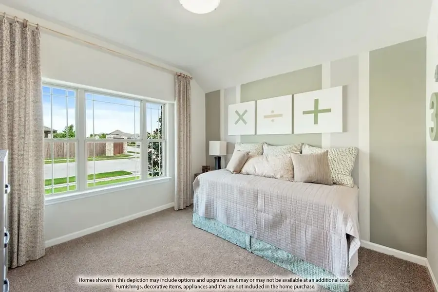 Bedroom with carpet flooring, large window with curtains, and decorative wall art above the bed
