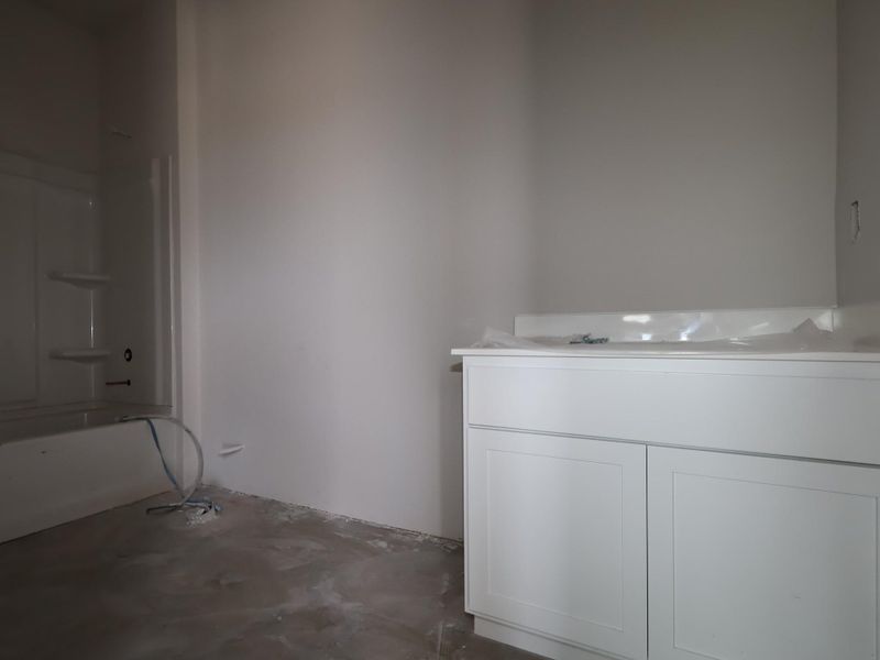 In-progress construction of a new home in Carillon, Manor, TX (Image 20).