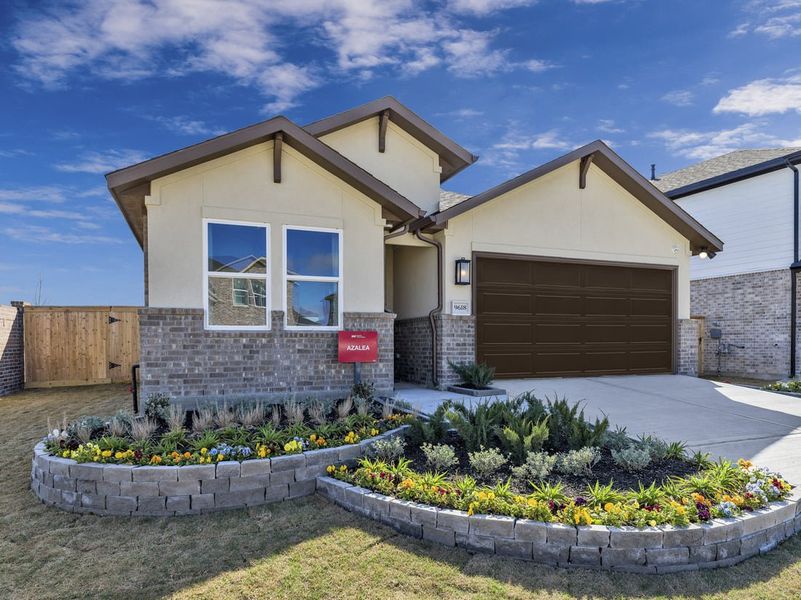 Representative exterior photo of a completed home built from the Azalea II by Taylor Morrison in Redbud 45s, Hockley, TX (Image 1). Representative exterior photo of a completed home built from the Azalea II by Taylor Morrison in Redbud 45s, Hockley, TX (Image 1).
