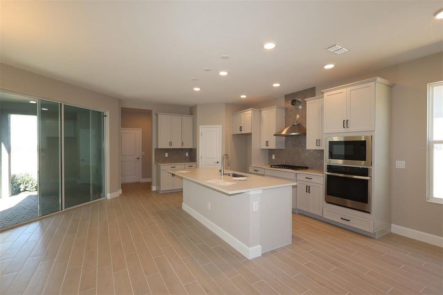 Furnished interior view inside a new home in Lake Star at Ovation, Winter Garden (Image 9).