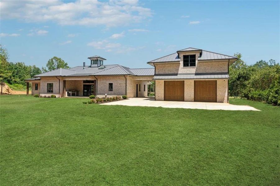 Front exterior of a new home in , Cumming, GA, highlighting curb appeal (Image 2). Front exterior of a new home in , Cumming, GA, highlighting curb appeal (Image 2).