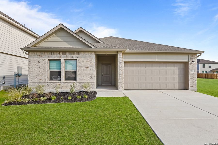 Front exterior of a new home in Summerlin, Castroville, TX, highlighting curb appeal (Image 23). Front exterior of a new home in Summerlin, Castroville, TX, highlighting curb appeal (Image 23).