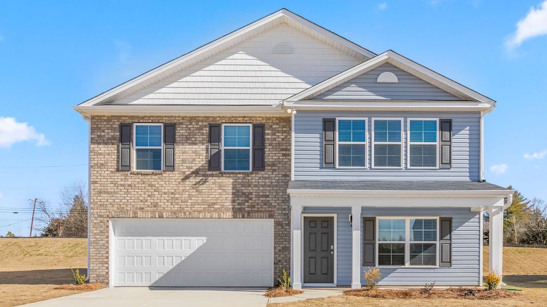 Front exterior of a new home in Aspen Place, Thomasville, NC, highlighting curb appeal (Image 1).