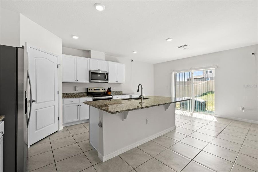 Furnished interior view inside a new home in Eden Hills, Lake Alfred (Image 9).