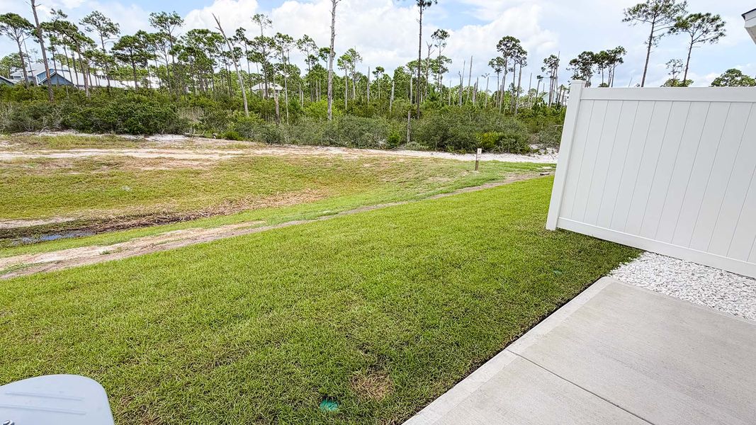 Exterior details and patio area of a home in WindMark Beach, Port Saint Joe (Image 23).