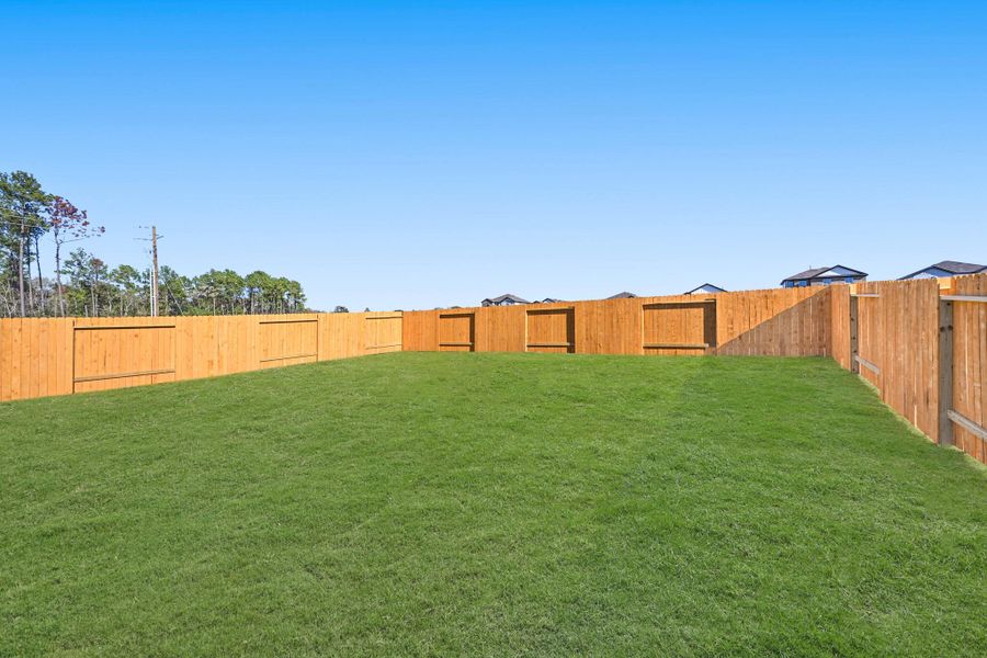 Exterior details and patio area of a home in Lexington Heights, Willis (Image 2).