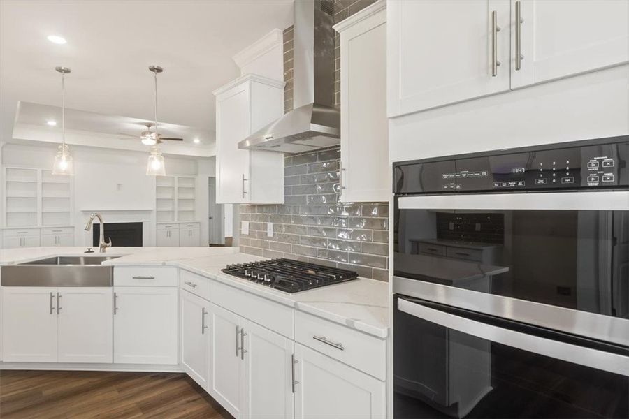 An open kitchen layout flows seamlessly toward the