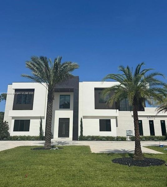 Front exterior of a new home in , Parkland, FL, highlighting curb appeal (Image 2). Front exterior of a new home in , Parkland, FL, highlighting curb appeal (Image 2).