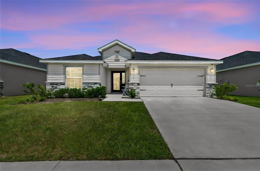 Front exterior of a new home in , Zephyrhills, FL, highlighting curb appeal (Image 25).