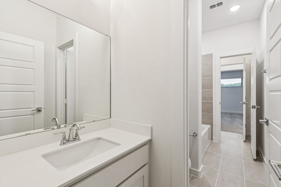Bathroom in the Picasso II home plan by Trophy Signature Homes – REPRESENTATIVE PHOTO Bathroom in the Picasso II home plan by Trophy Signature Homes – REPRESENTATIVE PHOTO