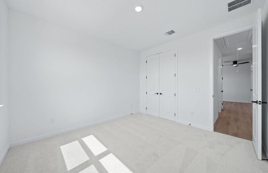 Spacious, unfurnished interior of a new home in 6 Creeks, Kyle (Image 29).