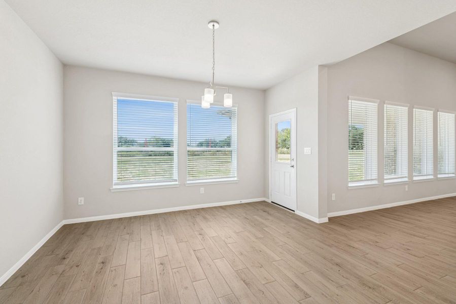 Sun-lit dining area Sun-lit dining area