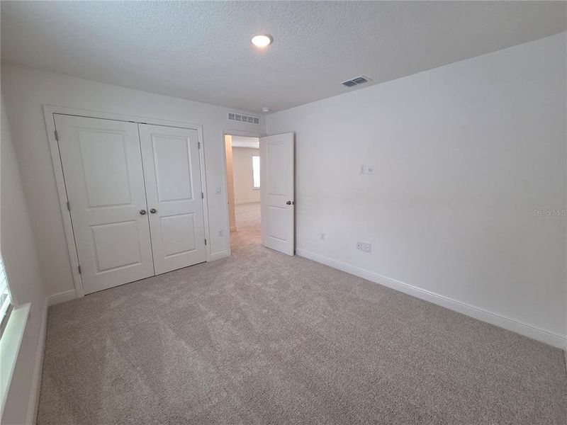Spacious, unfurnished interior of a new home in Villamar, Winter Haven (Image 43).