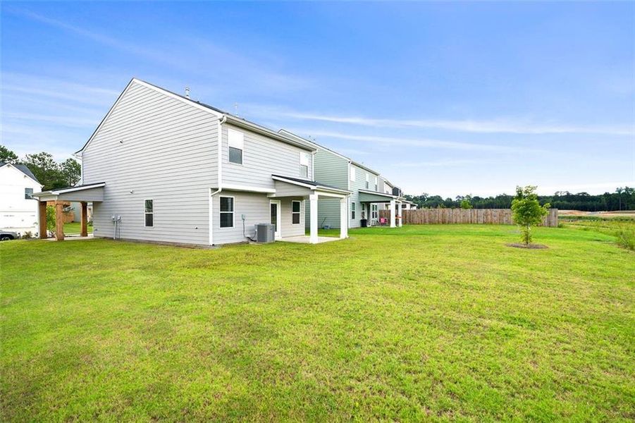 Exterior details and patio area of a home in Crossvine Village, LaGrange (Image 4). Exterior details and patio area of a home in Crossvine Village, LaGrange (Image 4).