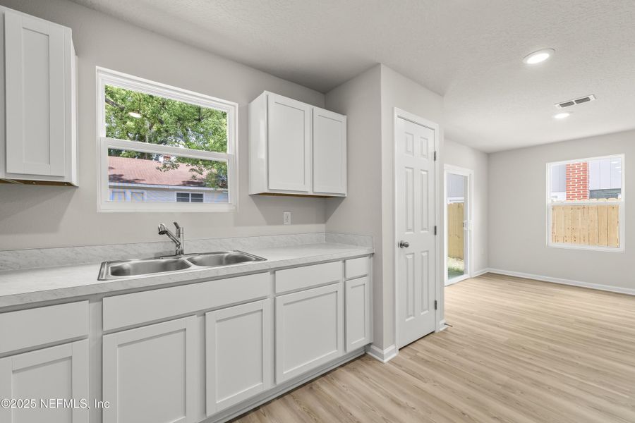 Furnished interior view inside a new home in , Jacksonville (Image 10). Furnished interior view inside a new home in , Jacksonville (Image 10).