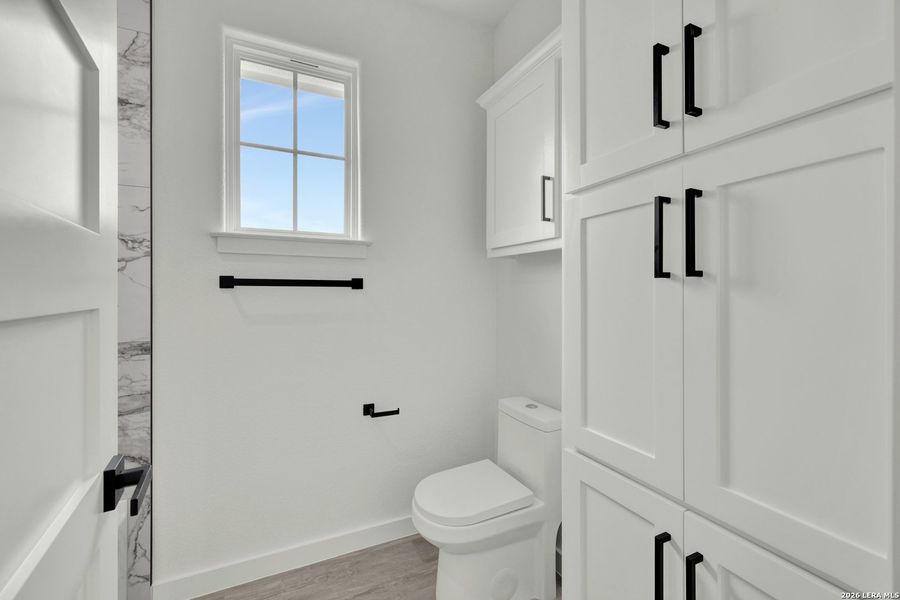 Furnished interior view inside a new home in , Seguin (Image 13).