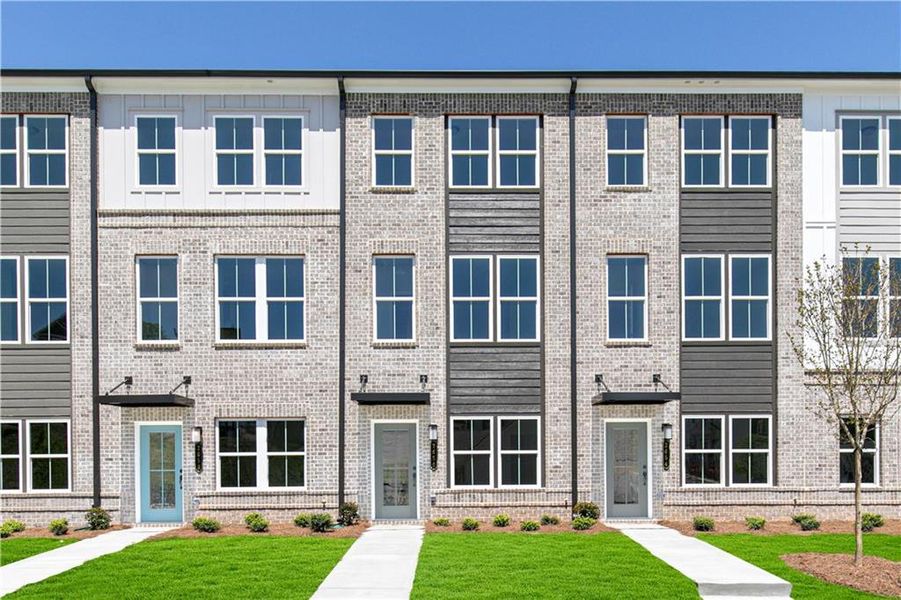 Front exterior of a new home in Westside Bend at Proctor Creek Townhomes, Atlanta, GA, highlighting curb appeal (Image 18). Front exterior of a new home in Westside Bend at Proctor Creek Townhomes, Atlanta, GA, highlighting curb appeal (Image 18).