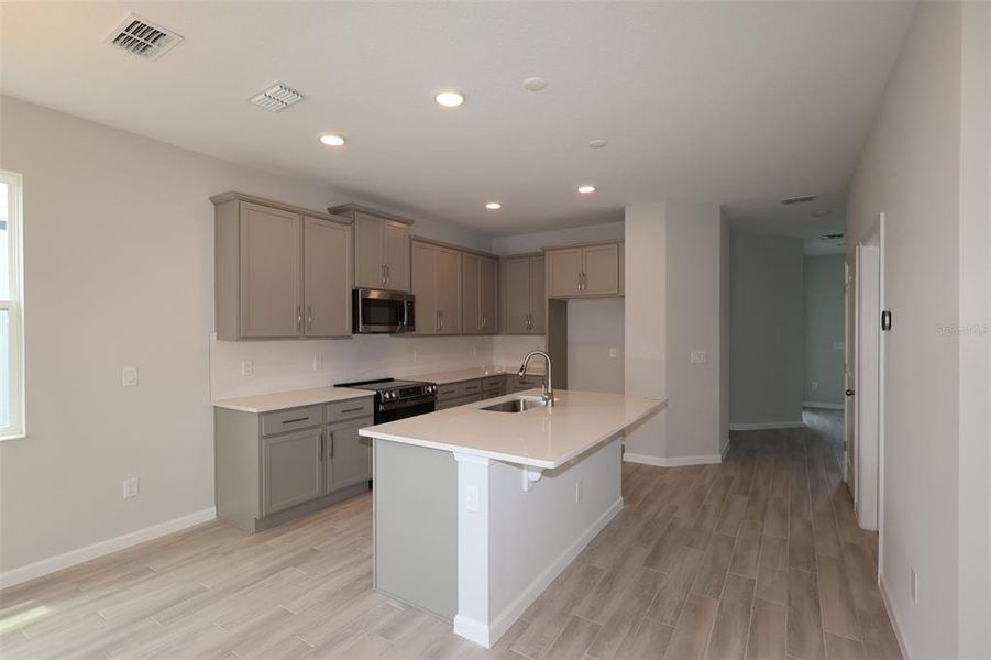 Furnished interior view inside a new home in Center Lake on the Park, St. Cloud (Image 10).