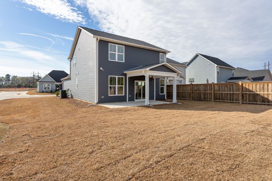Exterior details and patio area of a home in River Tide Farms, Bolivia (Image 3). Exterior details and patio area of a home in River Tide Farms, Bolivia (Image 3).