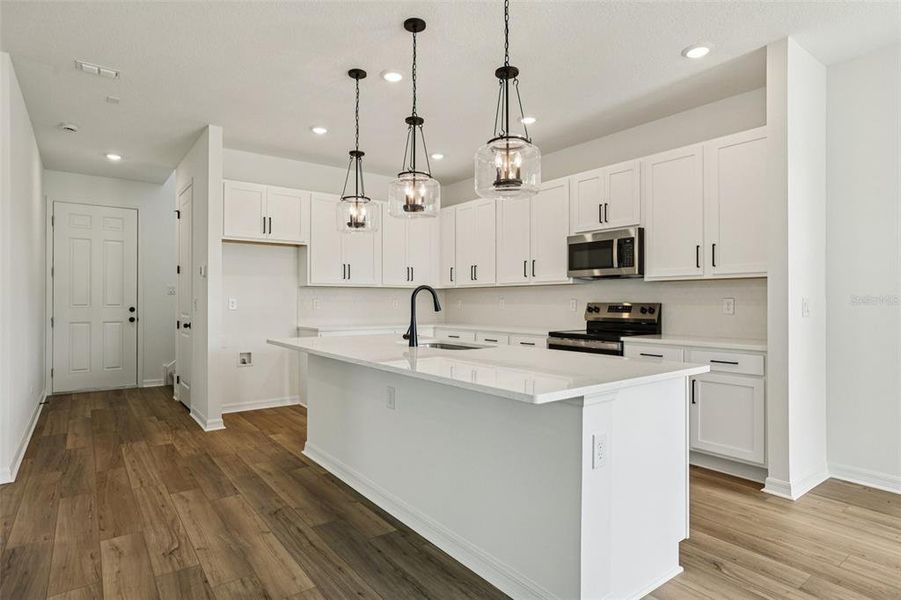Furnished interior view inside a new home in Ellington Classical, St. Cloud (Image 5). Furnished interior view inside a new home in Ellington Classical, St. Cloud (Image 5).