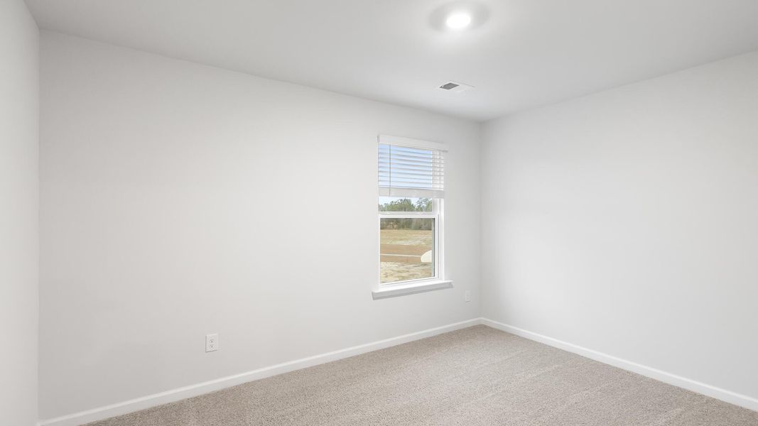 Spacious, unfurnished interior of a new home in Pine Hills at Cane Bay, Summerville (Image 20).
