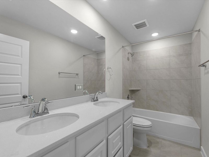 Furnished interior view inside a new home in Mason Woods, Cypress (Image 10).