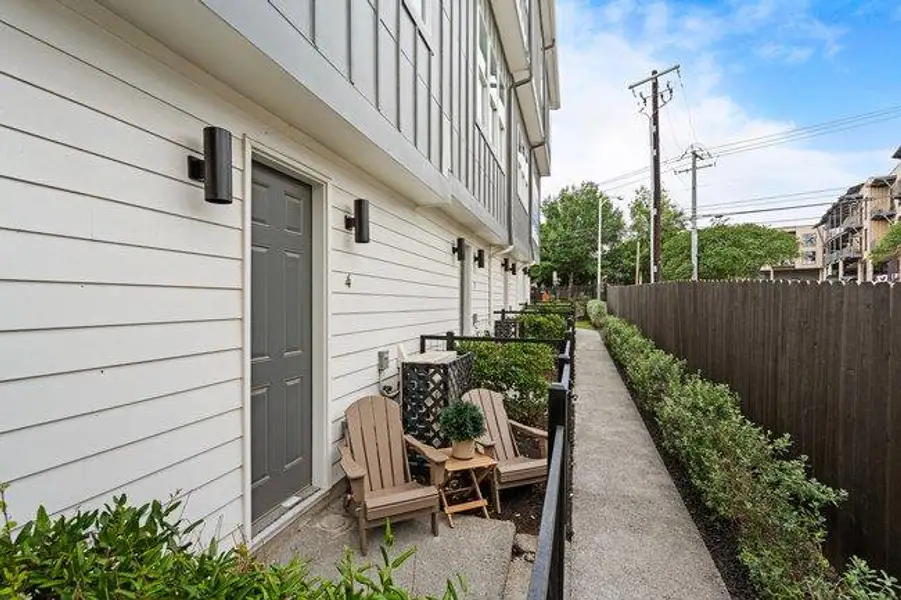 Exterior details and patio area of a home in Bluebonnet Lofts, Austin (Image 1). Exterior details and patio area of a home in Bluebonnet Lofts, Austin (Image 1).