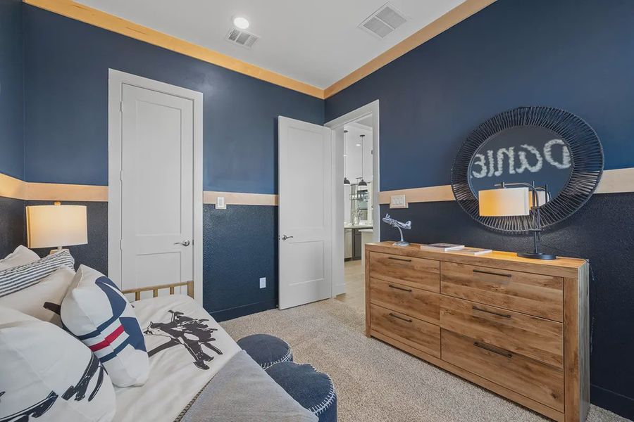 Representative furnished interior of a home built from the Bonneville by Chesmar Homes in Grange, Katy (Image 26).
