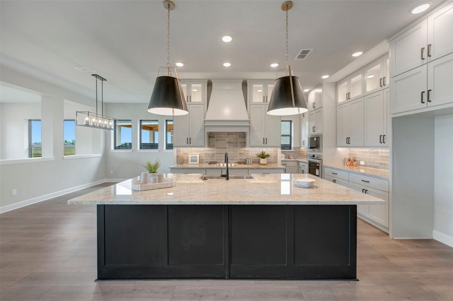 Furnished interior view inside a new home in Harvest Green 65', Richmond (Image 7).