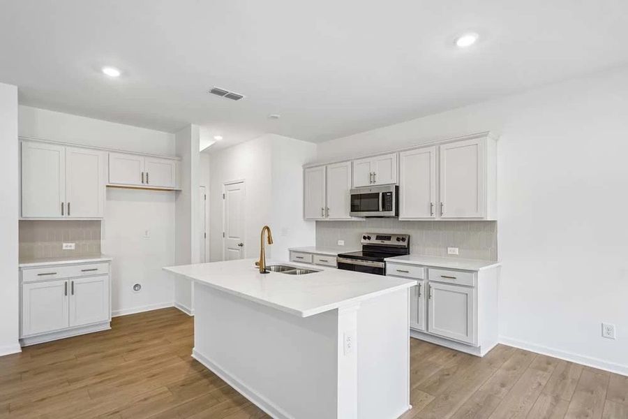 Representative Photo: Kitchen featuring Serene Collection Finishes