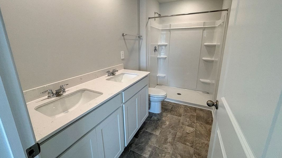 Representative furnished interior of a home built from the GREENBRIAR by D.R. Horton in Parkside Point, Portland (Image 8).