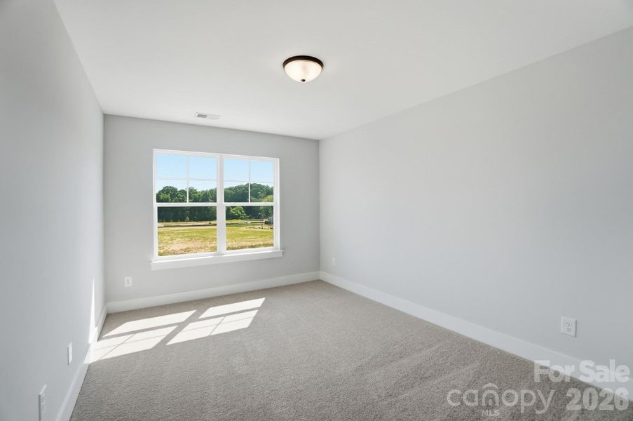 Spacious, unfurnished interior of a new home in Blythe Mill Townhomes, Waxhaw (Image 43).