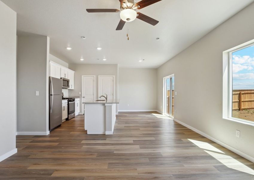 The family room is spacious and open to the dining room and kitchen.