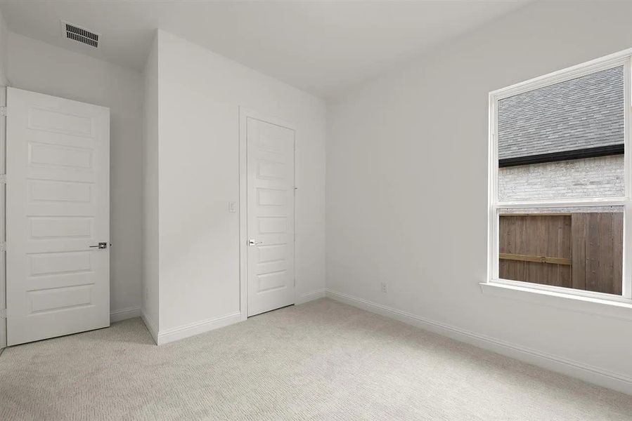 Spacious, unfurnished interior of a new home in Wolf Ranch South Fork, Georgetown (Image 12).