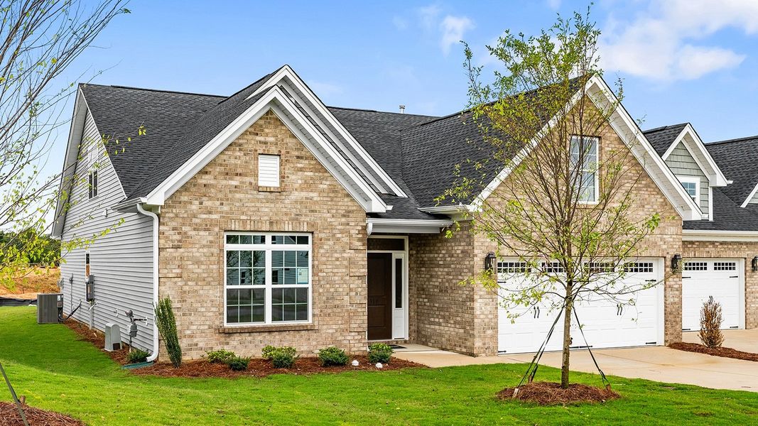 Front exterior of a new home in Fieldstone, Lexington, NC, highlighting curb appeal (Image 2).