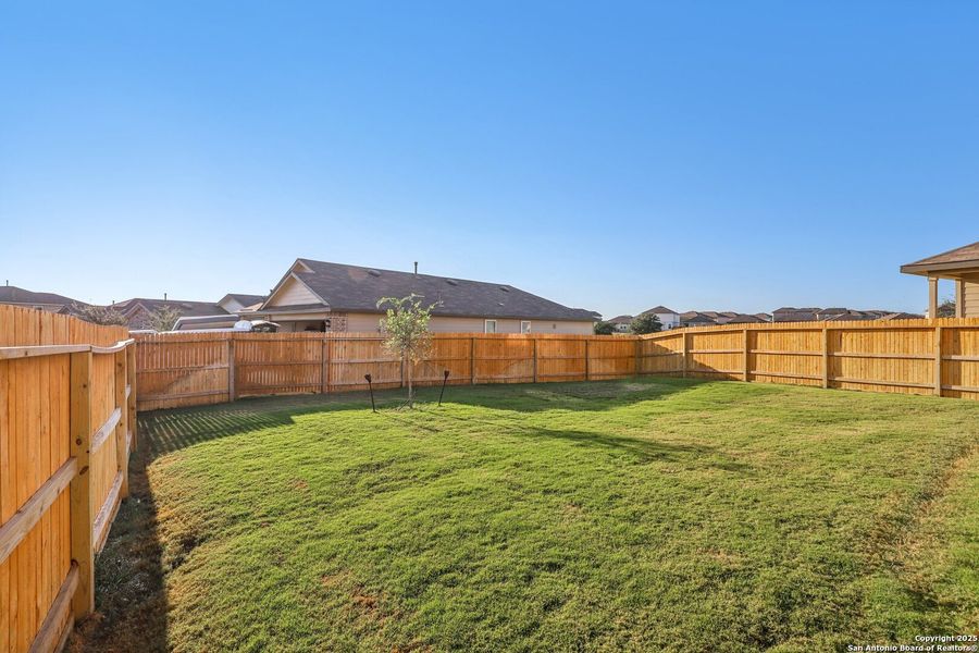 Exterior details and patio area of a home in The Links at River Bend, Floresville (Image 19). Exterior details and patio area of a home in The Links at River Bend, Floresville (Image 19).