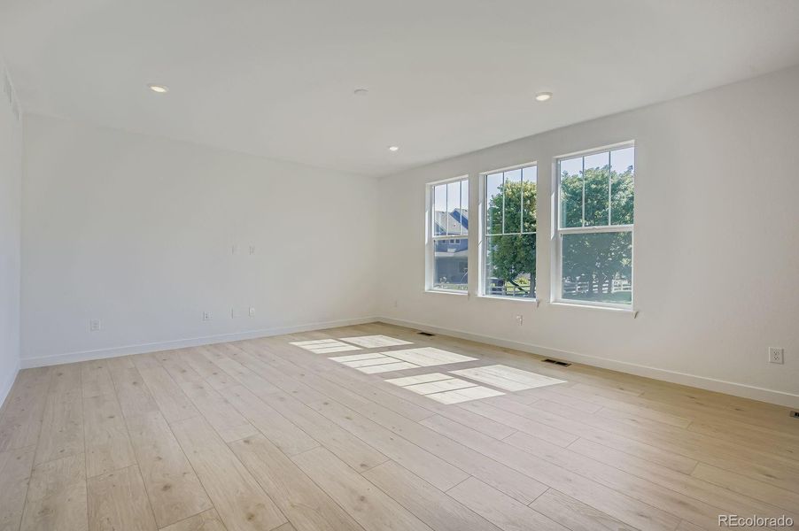 Spacious, unfurnished interior of a new home in Riano Ridge: The Grand Collection, Loveland (Image 13).