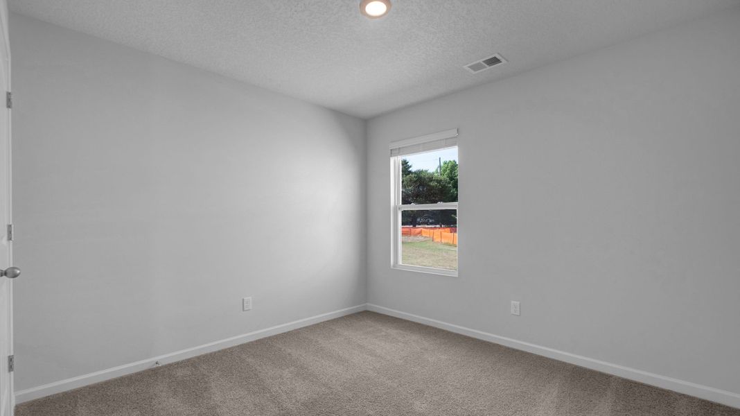 Spacious, unfurnished interior of a new home in Hedge Rose, Somerville (Image 30).