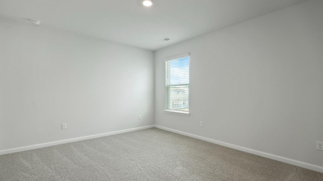 Spacious, unfurnished interior of a new home in Pine Hills at Cane Bay, Summerville (Image 23).