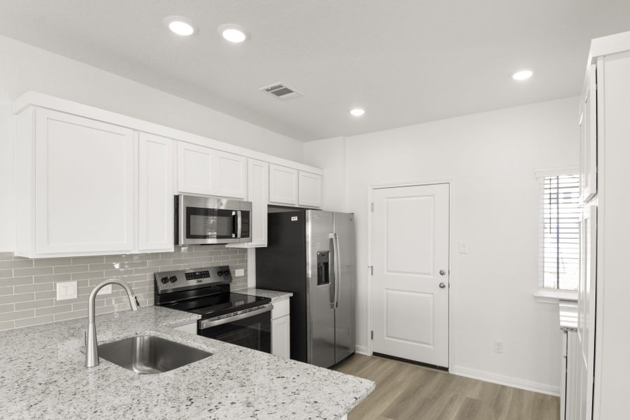 Furnished interior view inside a new home in Cool Water at Sonterra, Jarrell (Image 7).