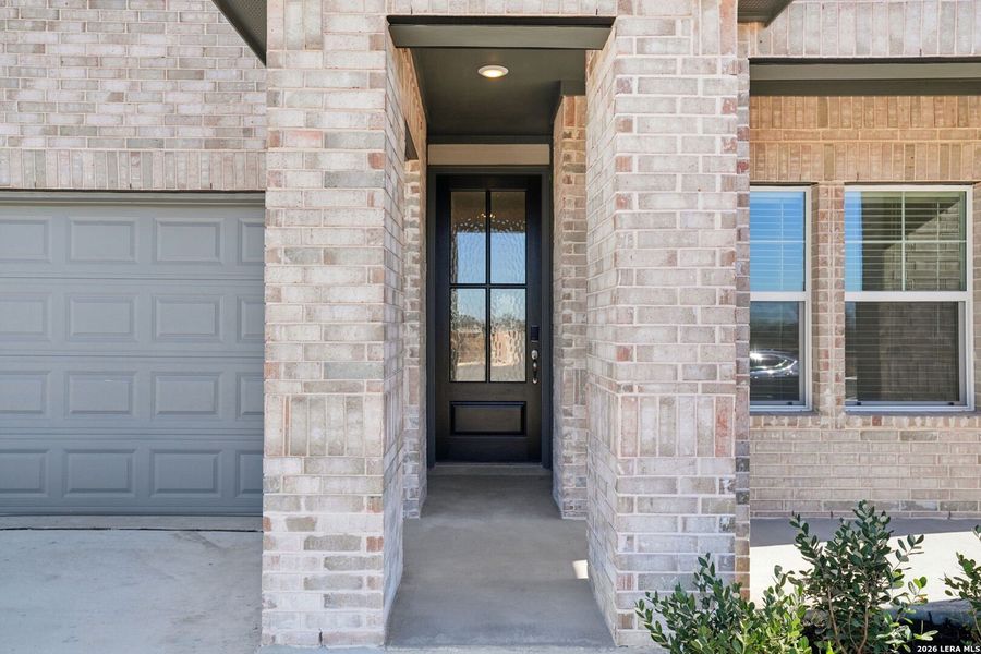 Exterior details and patio area of a home in Carmel Ranch, Schertz (Image 3).
