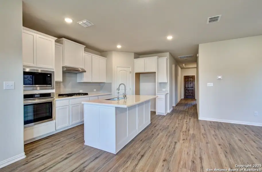 Furnished interior view inside a new home in Stream Waters, Seguin (Image 6).