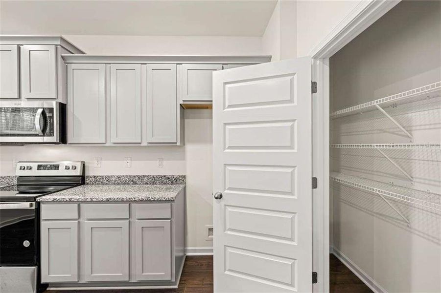 Furnished interior view inside a new home in Oakchase at Hampton, Hampton (Image 44).